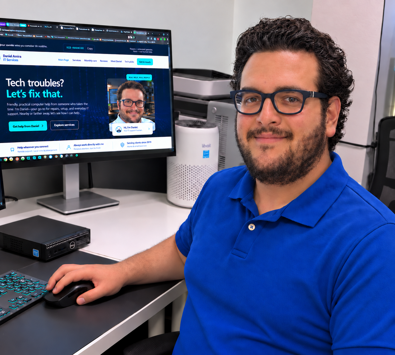 Daniel Amira at his computer workspace