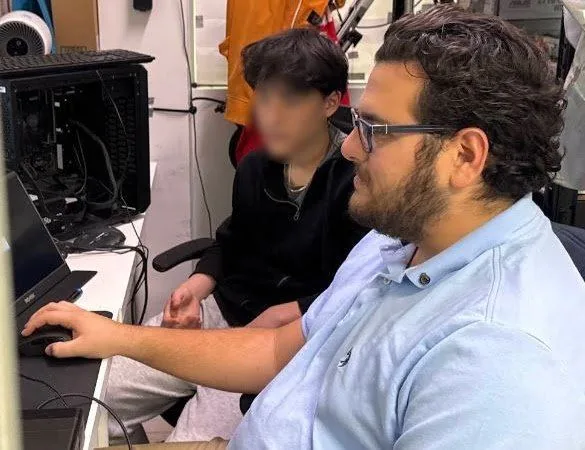 Daniel working with client